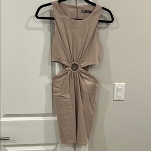 Elegant Beige Dress with Cut-Out Design